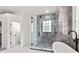 Spa-like bathroom with a glass shower and standalone soaking tub at 1700 Shandwick Ct, Longwood, FL 32779