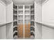 Large walk-in closet with shelving and built-in drawers at 1700 Shandwick Ct, Longwood, FL 32779