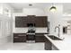 Updated kitchen with stainless appliances, stone countertops and stylish faucet at 1700 Shandwick Ct, Longwood, FL 32779