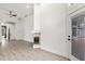 Bright living room features neutral paint, fireplace, and sliding door at 1700 Shandwick Ct, Longwood, FL 32779