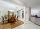 Open dining room with hardwood floors and natural light at 1701 Lucky Pennie Way, Apopka, FL 32712