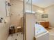 Bathroom featuring a walk-in shower and a soaking tub at 1701 Lucky Pennie Way, Apopka, FL 32712