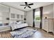 Charming bedroom with built-in shelves and warm wood floors at 172 Verde Way, Debary, FL 32713