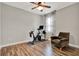 Bright exercise room with hardwood floors, and home exercise equipment at 172 Verde Way, Debary, FL 32713