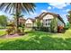 Attractive one-story home featuring lush lawn and mature landscaping at 172 Verde Way, Debary, FL 32713