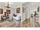 Welcoming foyer with decorative lighting, light grey paint, and access to other rooms at 172 Verde Way, Debary, FL 32713