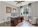 Well-lit office with wood flooring, large desk and a big window view at 172 Verde Way, Debary, FL 32713