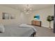 Bright bedroom featuring modern furniture, decor, and neutral color palette at 17441 Hidden Forest Dr, Clermont, FL 34714