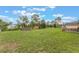 Sprawling backyard featuring a shed, above ground pool and deck perfect for outdoor enjoyment at 1785 6Th Ave, Deland, FL 32724