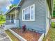 Close-up of the home's exterior highlighting the well-maintained landscaping and design at 1826 W Silver Springs Blvd, Ocala, FL 34475
