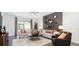 Comfortable living room featuring a plush sofa, stylish coffee table, and contemporary decor at 1852 Clear Sky Dr, Kissimmee, FL 34744