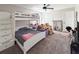 Cozy ' bedroom with bunk bed, decorative stuffed animals, and plenty of natural light at 224 Hammock Dunes Pl, Orlando, FL 32828