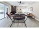 Beautiful living room showcasing a fireplace, a hammock, modern sofas, and plenty of space at 224 Hammock Dunes Pl, Orlando, FL 32828