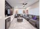 Cozy living room featuring couches, decorative art, recessed lighting, and a ceiling fan at 224 Hammock Dunes Pl, Orlando, FL 32828