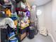 Functional storage area features shelving, ample storage space, and a washer and dryer at 224 Hammock Dunes Pl, Orlando, FL 32828