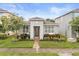 Attractive single-story home with lush landscaping and a welcoming entryway and walkway at 2417 Liner Ave, Apopka, FL 32703