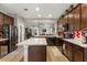 Well-equipped kitchen featuring a center island, stainless steel appliances, and ample countertop space for meal preparation at 2417 Liner Ave, Apopka, FL 32703