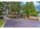 Charming brick condo building with lush landscaping and mature trees, located in a desirable neighborhood at 2500 Lee Rd # 243, Winter Park, FL 32789