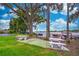 Community grounds with picnic tables, a grill, boat slips and waterfront access on the lake at 2500 Lee Rd # 243, Winter Park, FL 32789