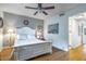 Bright main bedroom provides natural light and access to ensuite bathroom at 2500 Lee Rd # 243, Winter Park, FL 32789