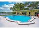 Enjoy the community pool with a large deck, seating, and a nearby building with restrooms and changing rooms at 2500 Lee Rd # 243, Winter Park, FL 32789