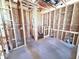 Unfinished bathroom with exposed framing and utility connections at 30166 Rustic Mill Street, Mount Dora, FL 32757