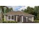 Charming single-story home with a gray exterior, well-manicured landscaping and an attached two car garage at 30166 Rustic Mill Street, Mount Dora, FL 32757