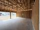 Spacious two-car garage with ample room and natural light, offering convenient parking and storage at 30166 Rustic Mill Street, Mount Dora, FL 32757