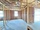 Interior framing showcasing a window and a blank canvas for customization and finishes at 30166 Rustic Mill Street, Mount Dora, FL 32757