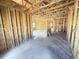 Interior framing with an open floor plan, ready for customization and finishes at 30166 Rustic Mill Street, Mount Dora, FL 32757