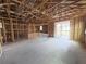 Interior framing of open floorplan showcasing natural light, ready for customization and finishes at 30166 Rustic Mill Street, Mount Dora, FL 32757