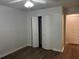 Comfortable bedroom with closet and wood-look flooring at 3120 Plaza Terrace Dr # 3120, Orlando, FL 32803