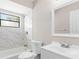Bathroom with shower-tub, vanity, and neutral decor at 3187 Shady Willow Dr, Orlando, FL 32808