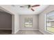 Bright room with natural light, a ceiling fan and wood look floors at 3187 Shady Willow Dr, Orlando, FL 32808
