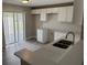 Bright kitchen featuring new countertops and ample cabinet space at 3187 Shady Willow Dr, Orlando, FL 32808