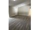 Spacious living room featuring modern flooring and neutral paint at 3187 Shady Willow Dr, Orlando, FL 32808