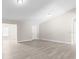 Open living area with new floors and neutral walls, perfect for entertaining and relaxing at 3187 Shady Willow Dr, Orlando, FL 32808