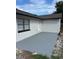 Outdoor patio area offering ample space for entertaining and featuring a neutral color at 3187 Shady Willow Dr, Orlando, FL 32808
