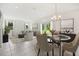 Open floor plan with dining and living room at 33313 Country House Dr, Sorrento, FL 32776