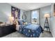 Cheerful bedroom showcasing fun space-themed decor, including a rocketship wall decor at 3348 Thicket St, Tavares, FL 32778