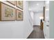 Welcoming entryway with wood floors, decorative art, and a staircase at 3348 Thicket St, Tavares, FL 32778