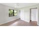 Bedroom with window, closet and ceiling fan at 338 Eastern Ave, St Cloud, FL 34769