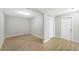 Finished room features wood-look floors and two closets at 338 Eastern Ave, St Cloud, FL 34769