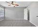 Spacious bedroom with plush carpeting, a ceiling fan, and plenty of natural light at 351 Lone Hill Dr # 206, Altamonte Springs, FL 32701