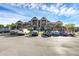 Exterior view showcasing the multi-level condos, private balconies, and dedicated parking at 351 Lone Hill Dr # 206, Altamonte Springs, FL 32701