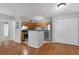 Bright kitchen features stainless appliances, wooden cabinets, and a convenient breakfast bar at 351 Lone Hill Dr # 206, Altamonte Springs, FL 32701