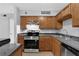 Well-equipped kitchen with modern appliances and ample cabinet space for storage at 351 Lone Hill Dr # 206, Altamonte Springs, FL 32701
