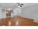 Spacious living room with wood floors, open layout to the kitchen at 351 Lone Hill Dr # 206, Altamonte Springs, FL 32701