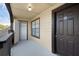 Cozy outdoor patio with door, closet, window, and wooden railing at 351 Lone Hill Dr # 206, Altamonte Springs, FL 32701