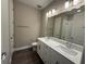 Bright bathroom features a double vanity, ample counter space and contemporary lighting at 368 Birkdale Dr, Daytona Beach, FL 32124